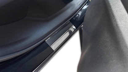 Tröskelskydd Toyota C-HR II 2023+ – kolfiber-look - Carlevel AB - Fordon och delar > Fordonsdelar > Karossdelar